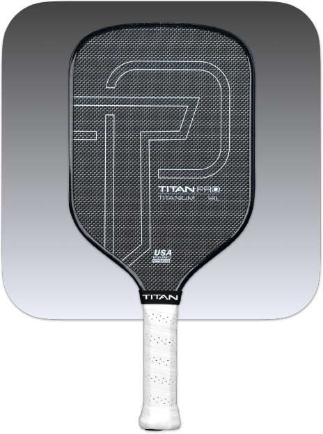 The Titan Pickleball Titan Pro Titanium 14L is a black carbon fiber paddle with a textured face, large “TP” logo, “TITAN PRO” and “USA Pickleball Approved” text, white grip tape handle, on a gray gradient background with rounded corners.