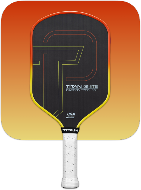 The Titan Pickleball Titan Ignite 16L is an elongated paddle with a black face, orange and yellow edges, a bold “T” design, and a white handle reading TITAN. Its orange-to-yellow background highlights its pro-level spin capabilities.