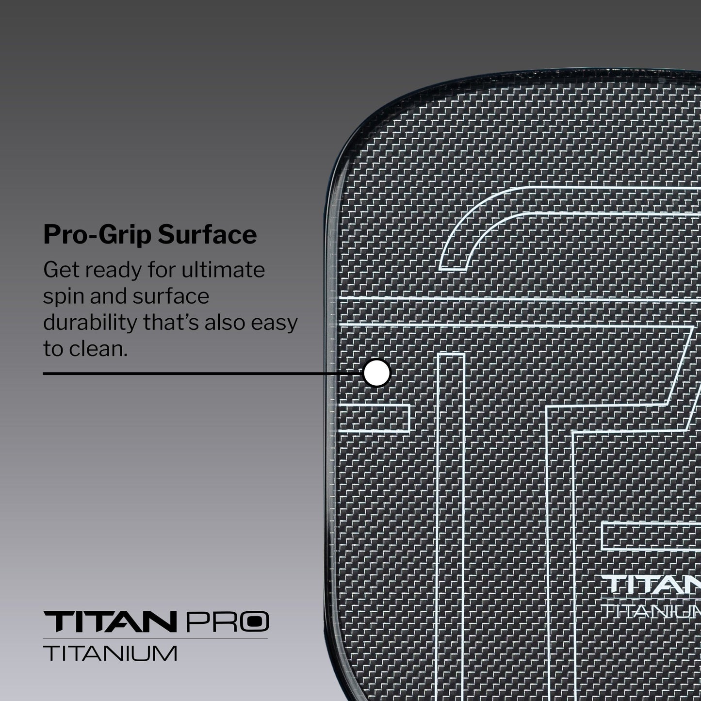 Close-up of the Titan Pickleball Titan Pro Titanium 14L paddle featuring a textured Pro-Grip Surface for ultimate spin, durable and easy-to-clean design. The Titan Pro branding appears at the bottom left.