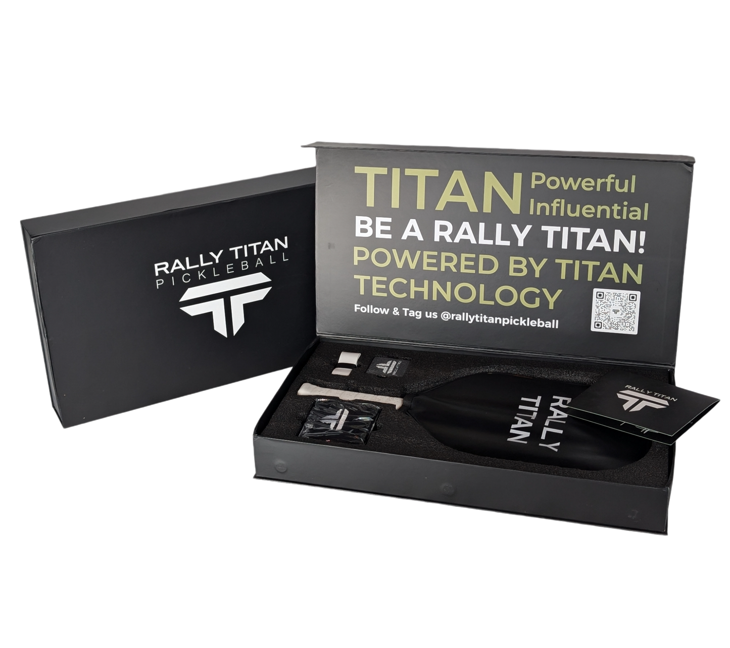 An open Rally Titan Pickleball box shows the Titan Pro 16MM paddle (T700 Titan Carbon Friction Surface, white with black accents), two wristbands, and accessories. The box lid displays bold “TITAN Powerful Influential” branding.