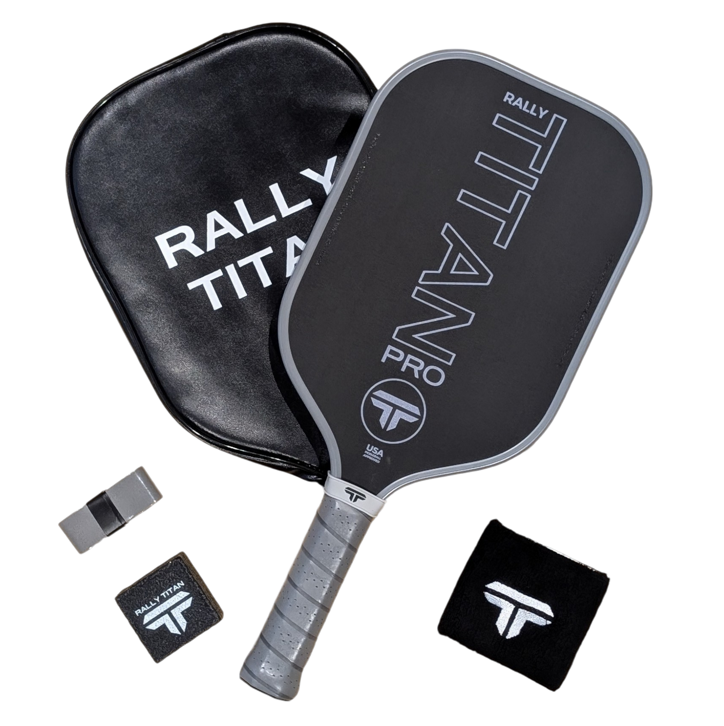 A black Rally Titan Pickleball Titan Pro 16MM paddle with T700 carbon friction surface and grey grip sits beside a matching zippered case, wristband, grip band, and rectangular accessory—all featuring the white Rally Titan logo. White background.