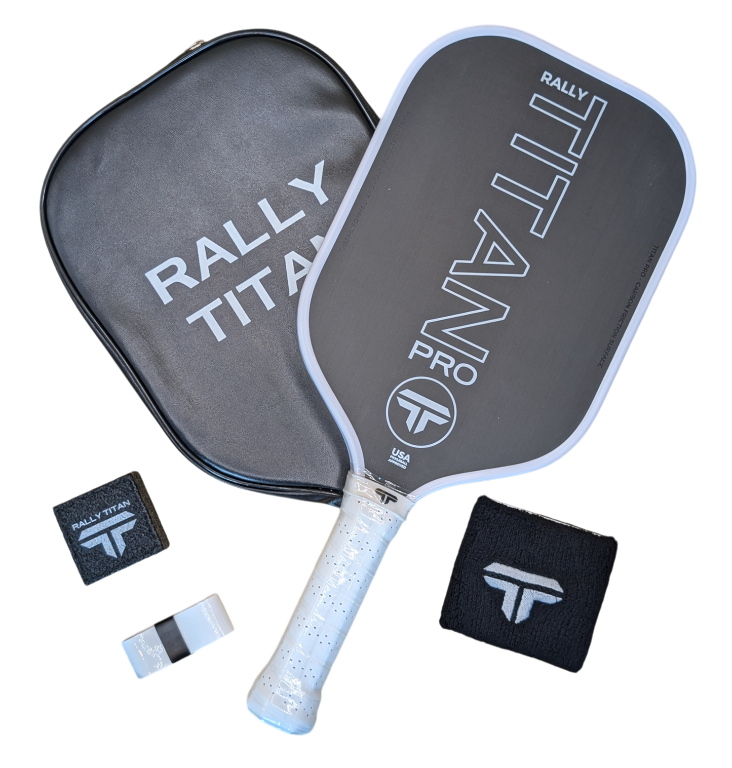 The Rally Titan Pickleball Titan Pro 16MM paddle in white with black accents is shown with a matching cover, two black wristbands featuring the Rally Titan logo, and a white-and-black sweatband, all set on a white background.