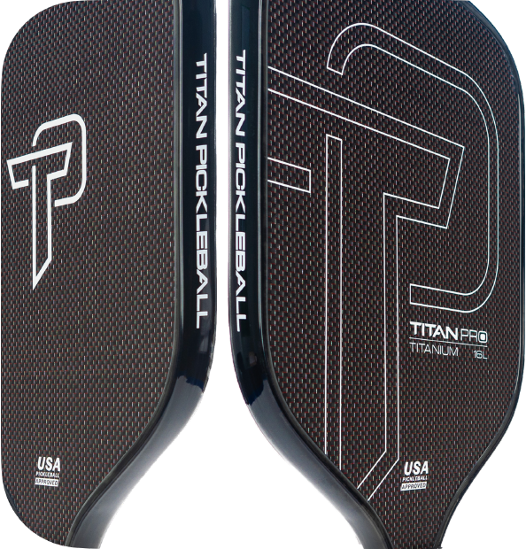 Close-up of two black Titan Pickleball paddles with textured surfaces. Each displays bold white text: geometric lines, "Titan Pickleball," "Titan Pro Titanium 16L," and "USA Pickleball Approved.