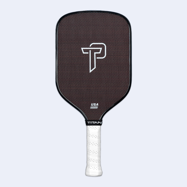 The Titan Pickleball Titan Pro Titanium 16L is a black paddle with a subtle grid pattern, bold white TP logo, white perforated grip, TITAN at the neck, and USA above it—perfect for players seeking top pickleball paddles.