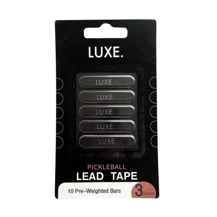 A black LUXE Pickleball Lead Tape package contains six silver bars arranged vertically. Text shows: PICKLEBALL LEAD TAPE, 10 Pre-Weighted Bars, a red circle with 3 Grams, and a hanging tab at the top like golf lead tape packs.
