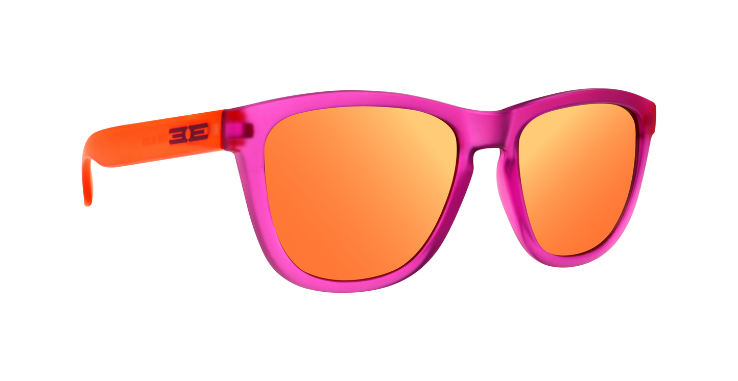 Epoch Eyewear’s VIBE sunglasses feature a translucent bright pink frame, vibrant orange mirrored polarized lenses, and orange arms with a raised design—delivering a bold, modern look.