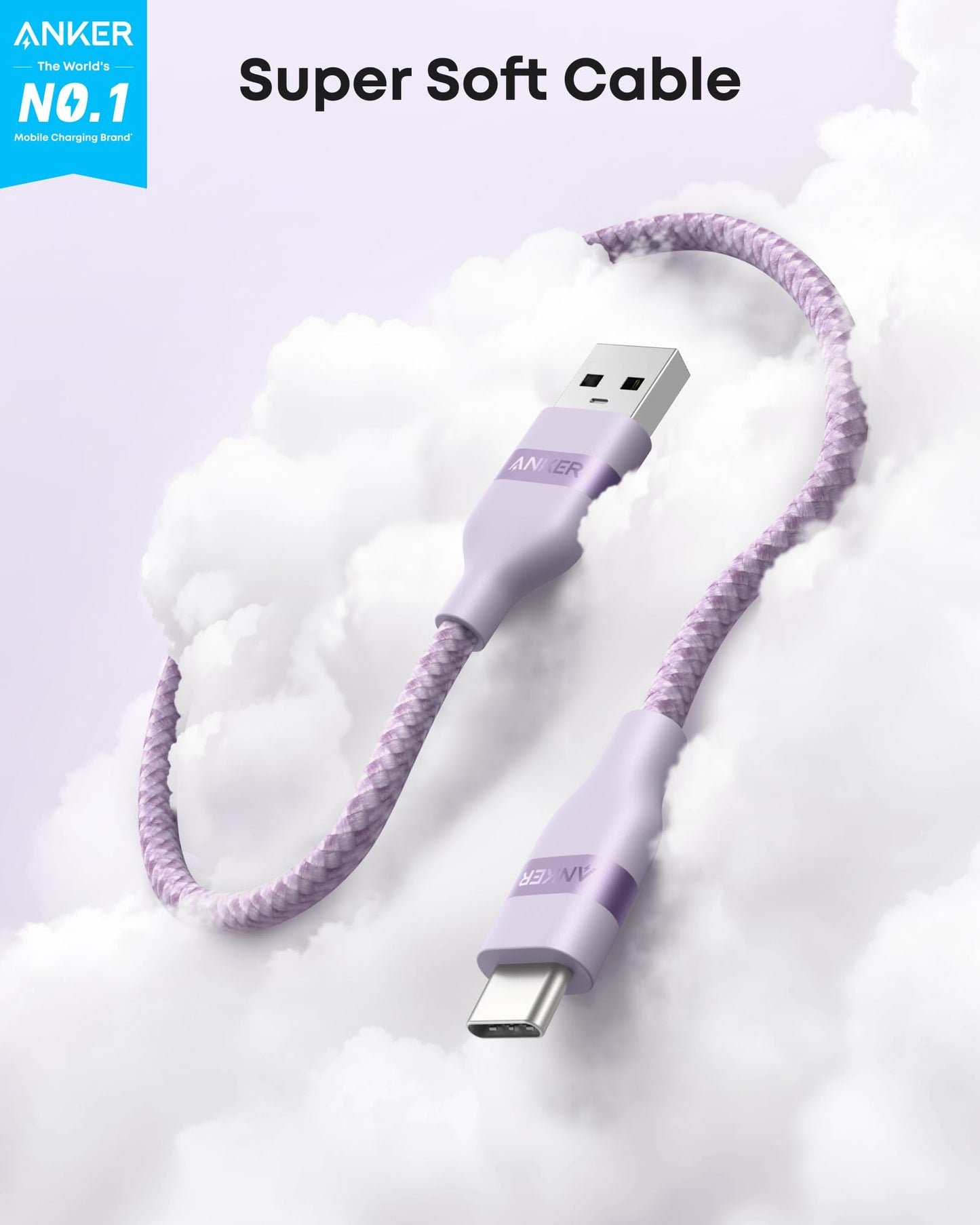 A lavender Anker USB-A to USB-C Cable (3 ft/6 ft, Upcycled-Braided) floats among clouds, highlighting its flexible, tangle-resistant design. A blue ANKER label reads "The World's No. 1 Mobile Charging Brand." "Super Soft Cable" is at the top.