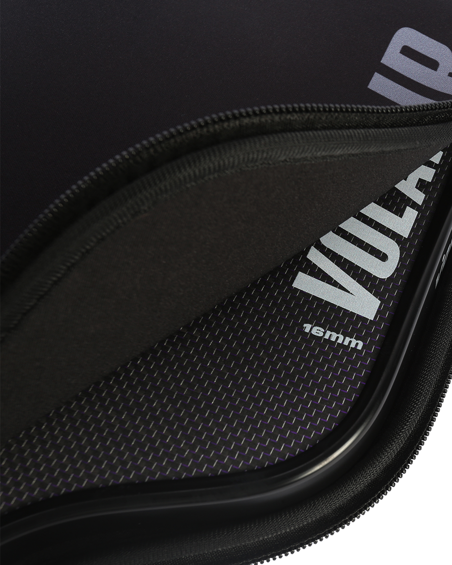 A close-up of a zippered case, partially open to reveal a textured inner surface with "VOLAIR PICKLEBALL" and "V.1F/WB 16MM" printed in white—featuring fine dotted fabric ideal for protecting your V.1F/WB 16mm Pickleball Paddle.