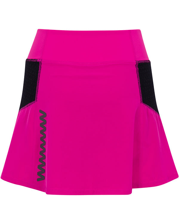 The Wringer Wear Moab Skirt features a bright pink, court-ready design with a flared hem, wide waistband, black mesh side panels, and wavy black line near the left hem. Its smooth, moisture-wicking fabric is perfect for active wear.