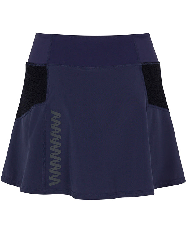 The Wringer Wear Moab Skirt is a navy-blue athletic skirt with a wide waistband, black mesh side panels, and a vertical zigzag reflective detail. Made from smooth, moisture-wicking fabric, it's perfect for sports or activewear.