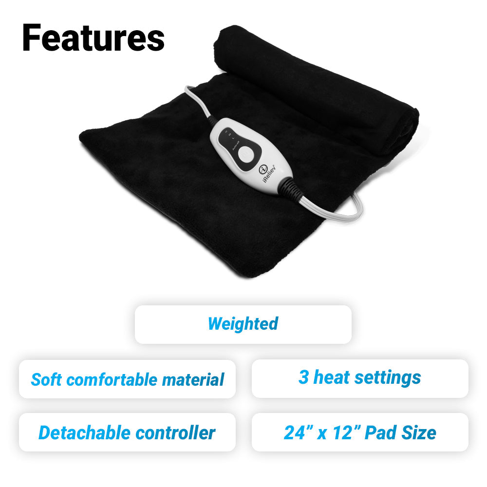 Features (bold): The iReliev Weighted Heating Pad, black with a white detachable controller, lies on a white surface. Features include weighted design, soft comfortable material, 3 heat settings, 24 x 12 pad size, and detachable controller.