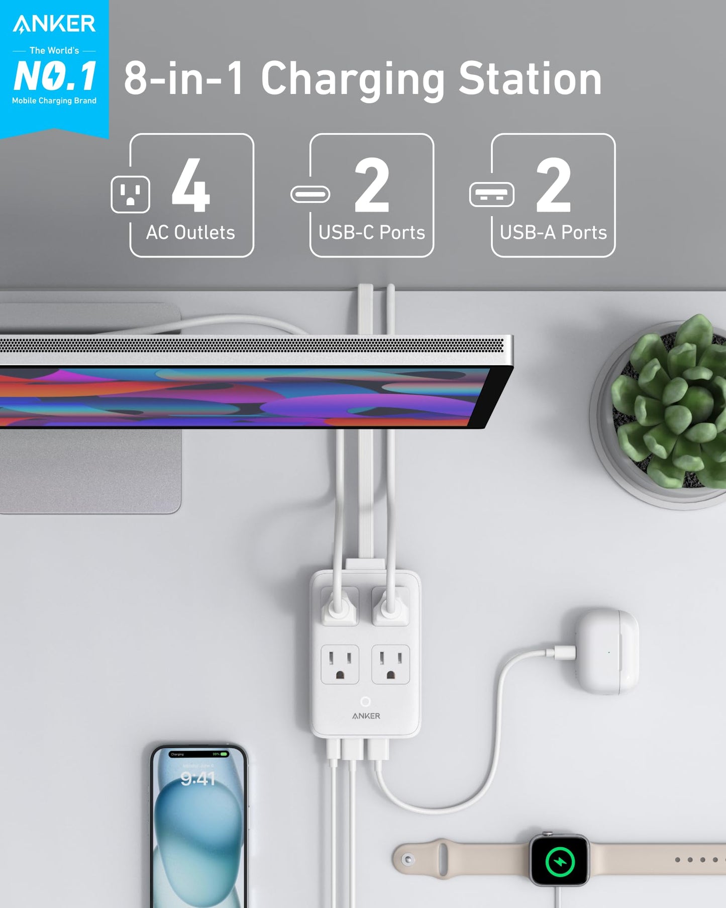A white Anker Charging Station (8-in-1, 20W) powers a monitor, phone, Apple Watch, AirPods case, and lamp on a desk with a plant. It features four AC outlets, two USB-C ports, and two USB-A ports.