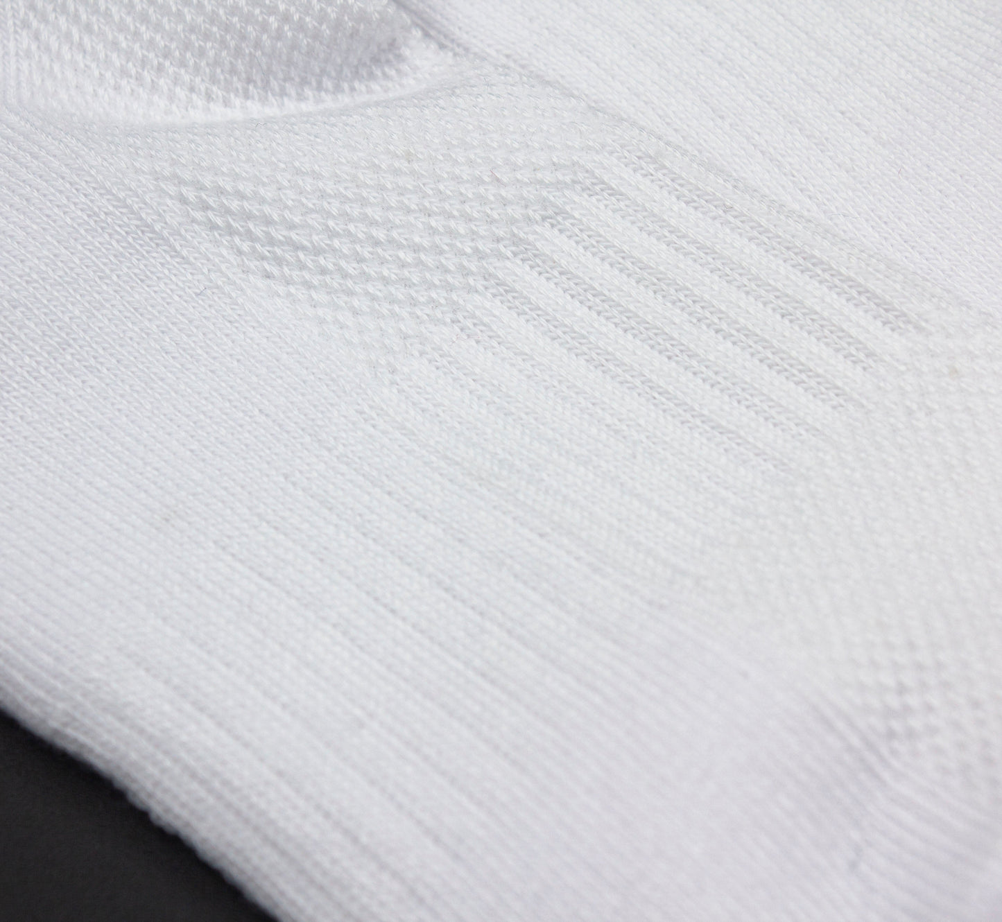 A close-up of Bodhi Performance's Performance Socks - GRIPtech™, showcasing a silicone grip for superior stability and comfort.