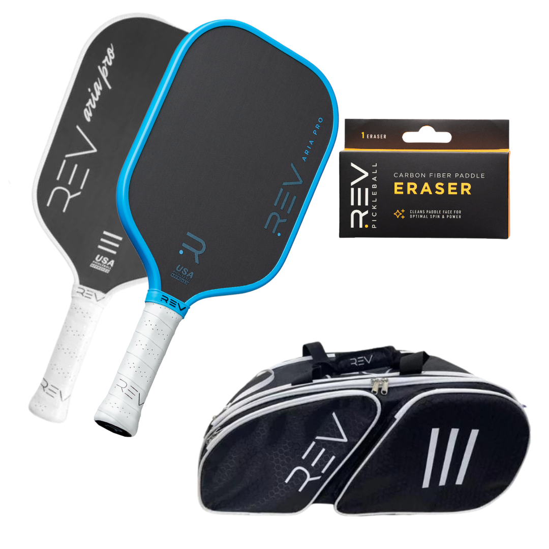 The Professional - Mix & Match - Bundle for 2 by REV Pickleball features two black paddles with blue trim and white handles, a black and yellow eraser, and a black duffel bag with “REV” branding, all displayed on a white background.