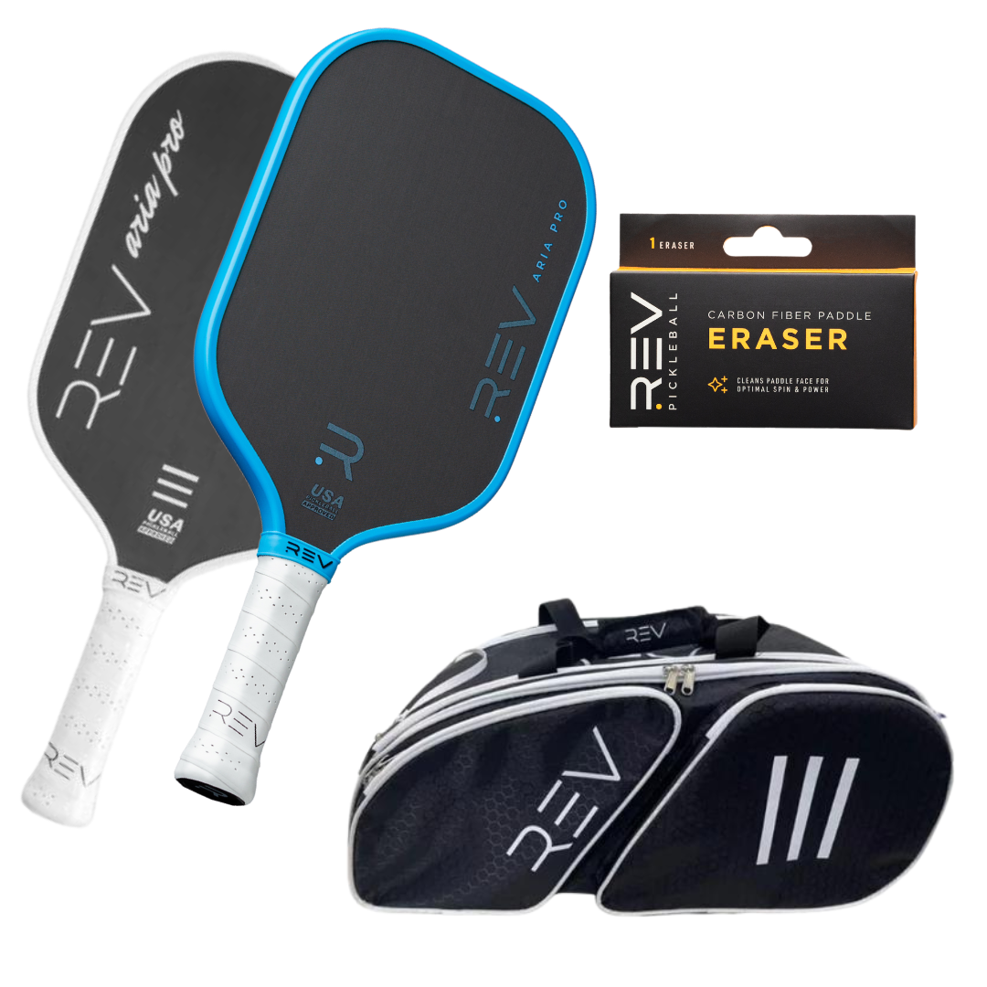 The Professional - Mix & Match - Bundle for 2 by REV Pickleball includes two black paddles with white grips, a carbon fiber paddle eraser in packaging, and a black and white zippered sports bag with a shoulder strap.