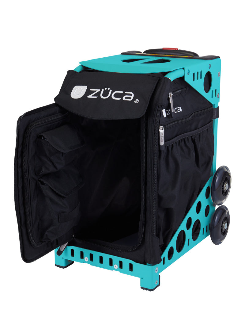 The ZUCA Pickleball Sport Black/Black rolling bag is shown with its black detachable interior exposed. The unzipped front reveals storage pockets, and the bag has sturdy wheels, side pockets, and a top handle for easy carrying.
