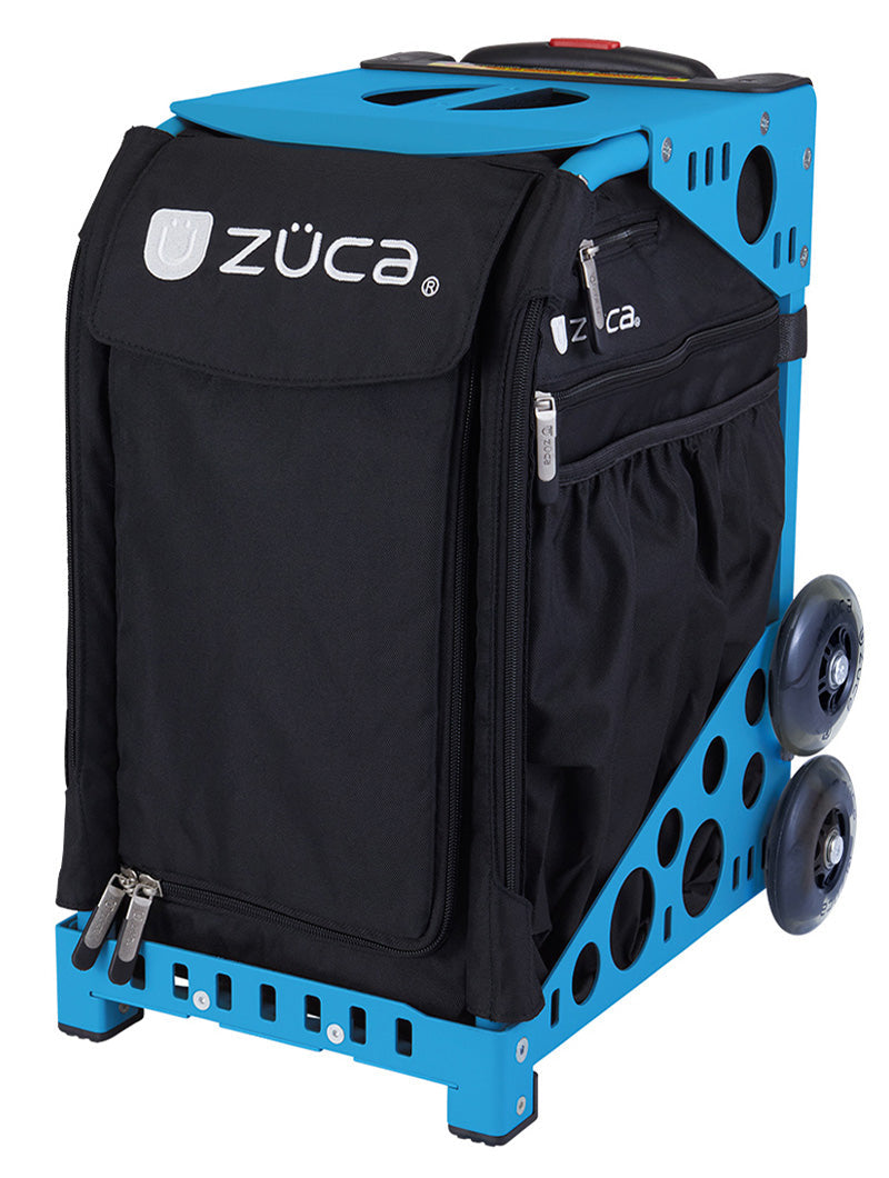 The ZUCA Pickleball Sport Black/Black rolling bag features a black zippered compartment, sturdy metal frame, two rugged wheels per side, top handle, side zip pocket, ventilation holes, and bold white ZUCA branding on the front flap.