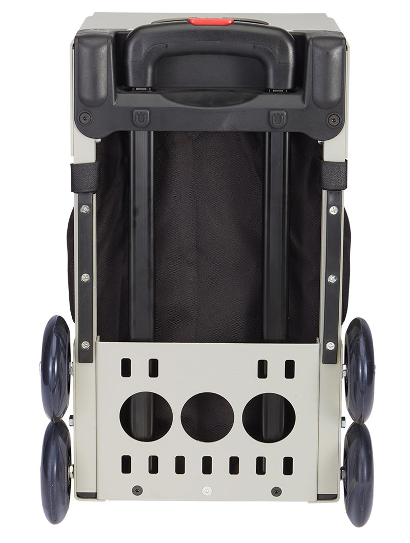 The ZUCA Pickleball Sport Black/Black folding cart, shown from below, has four large black wheels, a sturdy frame with cut-outs, and a black fabric compartment—perfect as a rolling pickleball bag or for convenient storage. Handle and release button visible.