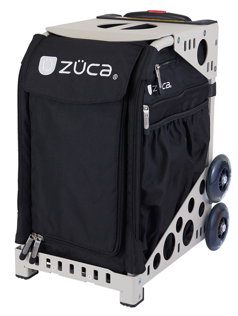 The ZUCA Pickleball Sport Black/Black rolling bag features a sturdy silver frame, dual wheels per side, top handle, zippered compartments, ventilation holes, and bold ZUCA branding—ideal for convenient pickleball storage and transport.