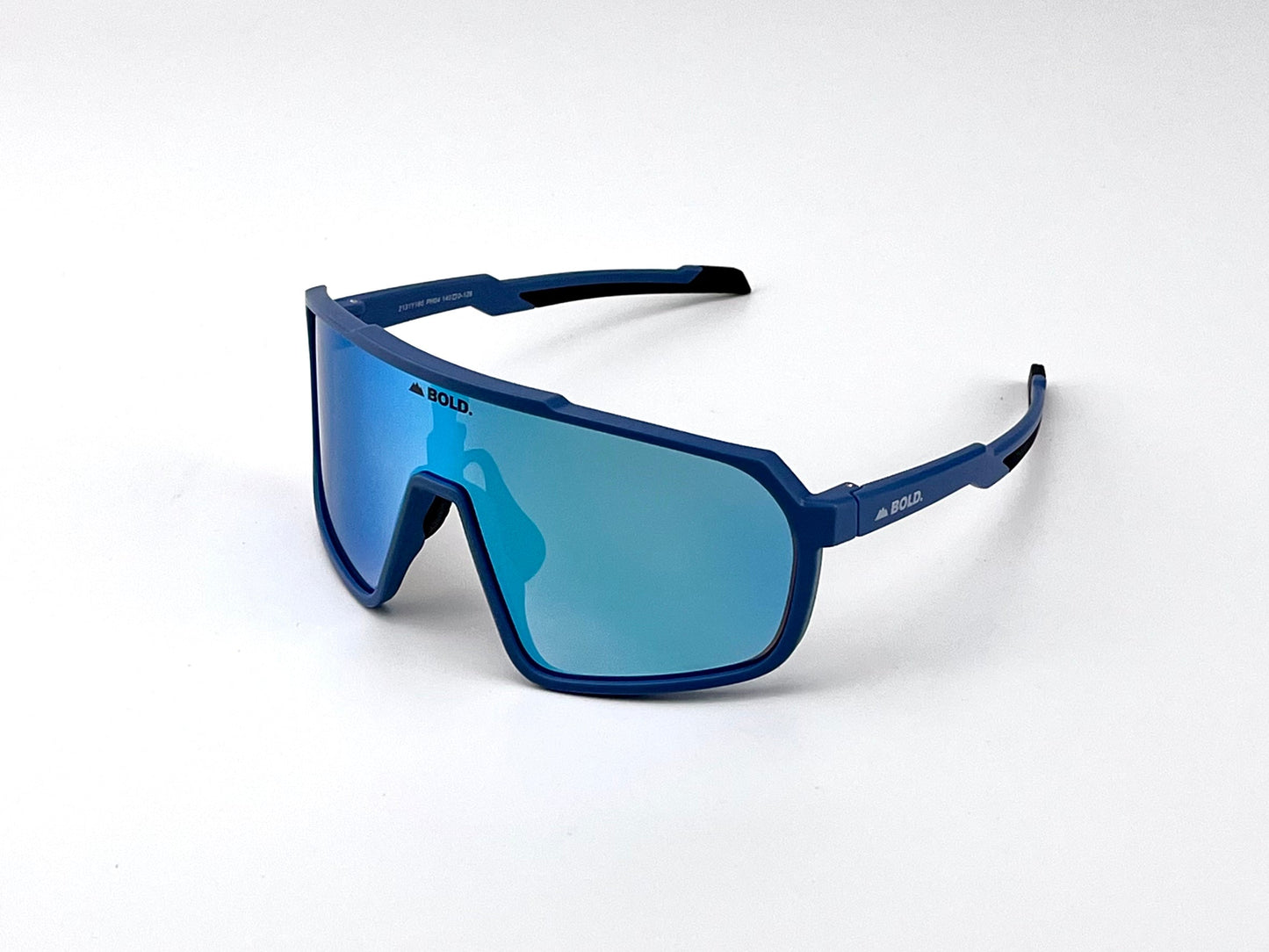 The BOLDouterwear BOLD Slayers Photochromic Sunglasses feature sporty blue oversized frames, large mirrored blue-tinted light-adaptive lenses, an angular design, slim arms with black tips, and "BOLD" branding near the lens and on the sides.