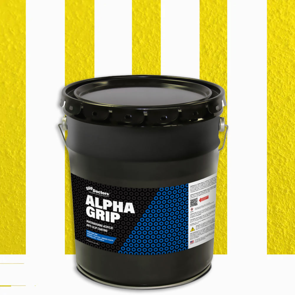A large black bucket of SlipDoctors Alpha Grip Non-Slip Stripe and Athletic Court Paint with blue accents and safety info sits against a yellow and white striped background. It features a metal handle and a tightly sealed lid.