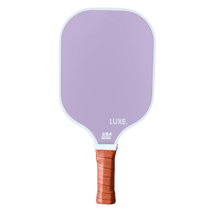 The Aesthetic Solids - Leisure paddle by LUXE Pickleball features a light purple fiberglass face with rounded top edges, white trim, a honeycomb core, light brown textured grip, and is USA Pickleball Approved.