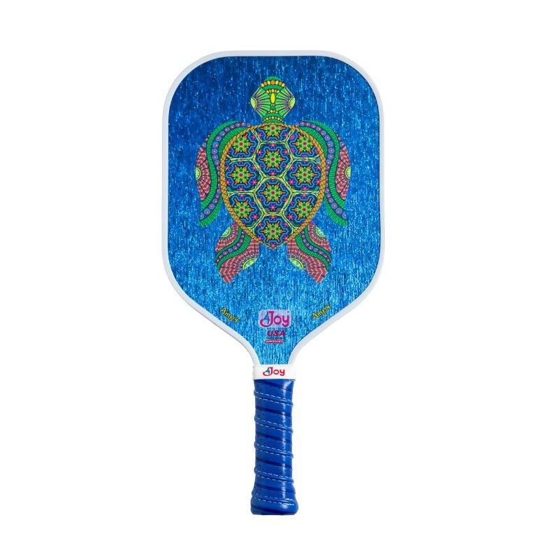 The AMP4 Series Turtle Design Pickleball Paddle by 4Joy Paddles features a blue background with a vibrant turtle in red, yellow, and green, a blue wrapped grip, Joy branding near the base, and a honeycomb core for enhanced performance.
