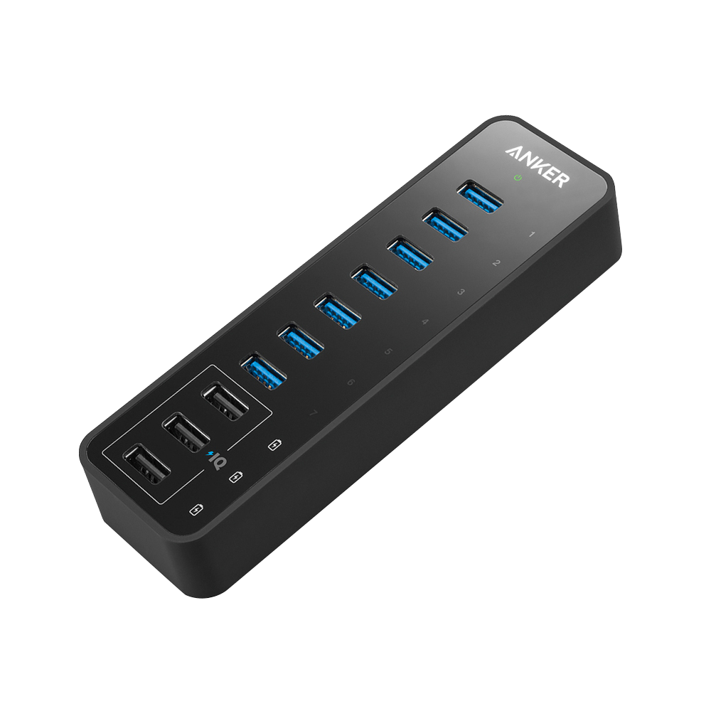 The Anker 60W 10-Port USB 3.0 Data Hub is a black rectangular device with seven blue high-speed USB 3.0 ports and three black USB ports. It features the Anker logo, a green indicator light, and is displayed on a plain white background.
