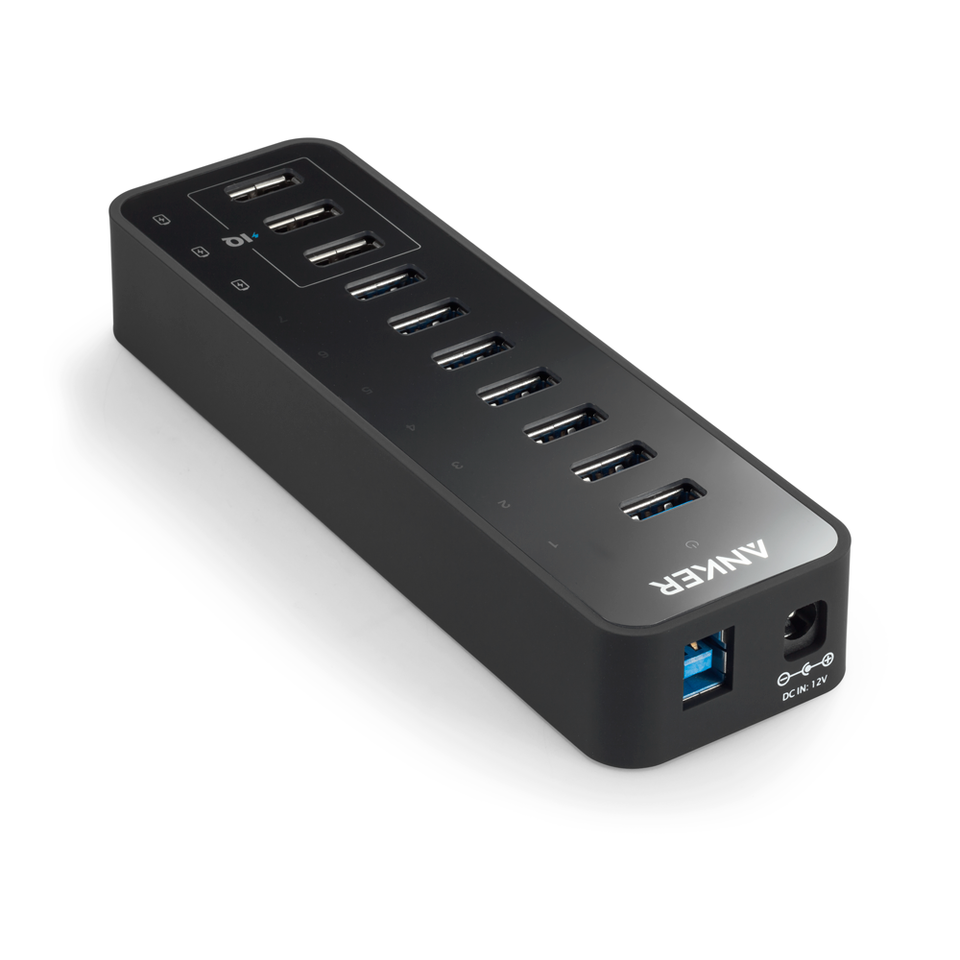 The Anker 60W 10-Port USB 3.0 Data Hub features ten top USB ports, LED indicators for each port, a side power input, a blue high-speed data port, a black rectangular design, and the Anker logo on top.