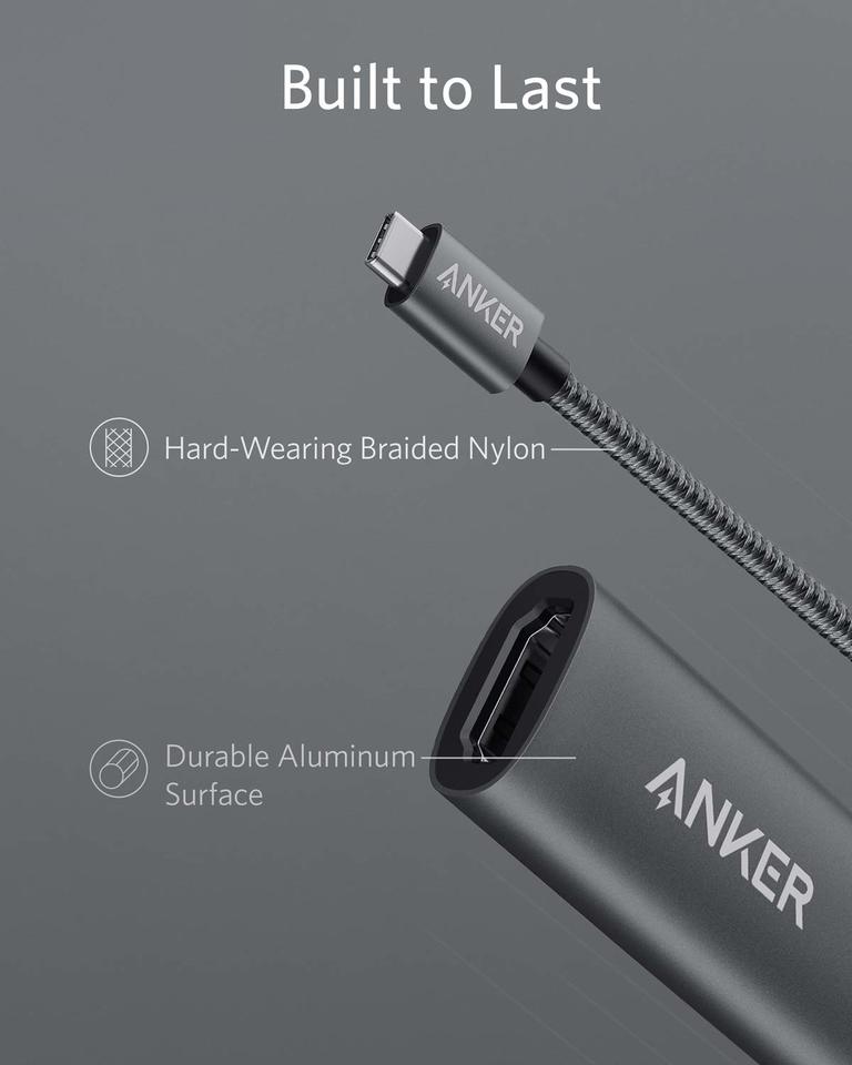 A close-up of the Anker 310 USB-C Adapter (4K HDMI) shows its braided nylon cable and durable aluminum surface. "Built to Last" is displayed at the top, with the Anker logo visible on both the cable and connector.