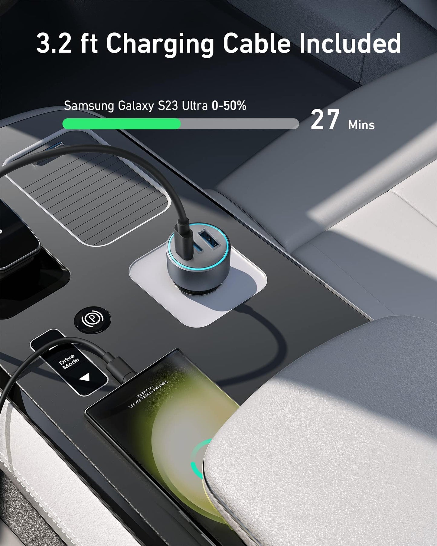 A 3.2 ft cable connects a Samsung Galaxy S23 Ultra to an Anker 535 Car Charger (67W) in the center console. The display reads 0–50% in 27 mins. Black and white seats and a gear shift with Drive Mode decorate the interior.