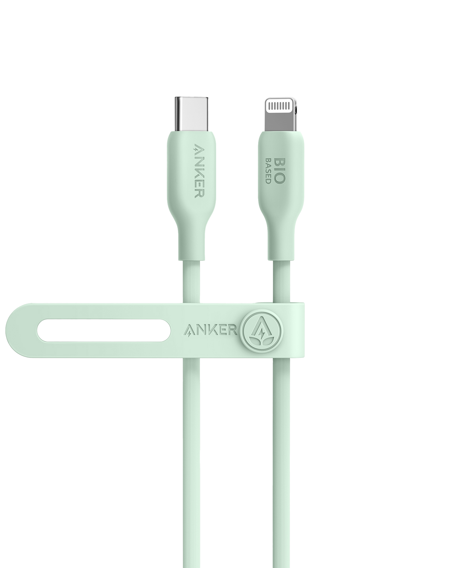 A mint green Anker 541 USB-C to Lightning Cable (Bio-Based) stands upright with “ANKER” and “BIO BASED” labels. A matching cable organizer strap featuring the Anker logo is attached by the connectors on a white background.