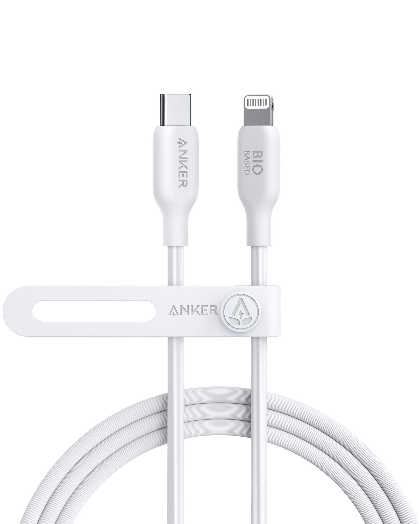 The Anker 541 USB-C to Lightning Cable (Bio-Based) is a coiled, eco-friendly white cable labeled "ANKER" and "BIO BASED." Fast charging for iPhone, it’s secured with a white strap bearing the Anker logo on a plain white background.