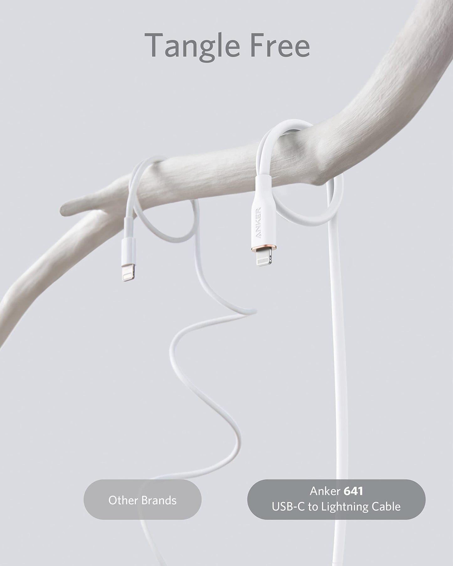 Two white charging cables hang from a branch. The left, labeled Other Brands, is tangled. The right, labeled Anker 641 USB-C to Lightning Cable (Flow, Silicone), hangs straight and tangle-free. Text reads: Tangle Free.