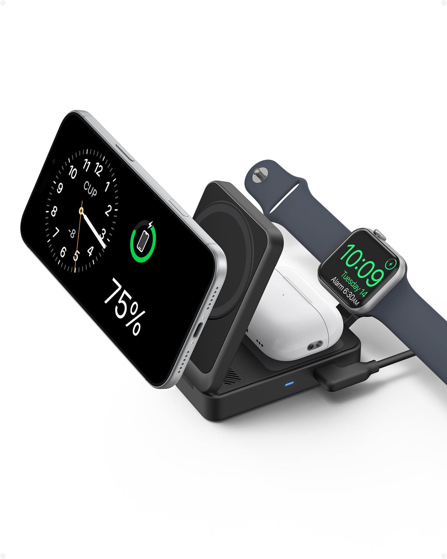 The Anker MagGo Wireless Charging Station (Foldable 3-in-1) by Anker charges a smartphone (75%), wireless earbuds in a white case, and a smartwatch (10:09, Tuesday, July 23), all arranged on its black 15W pad against a white background.