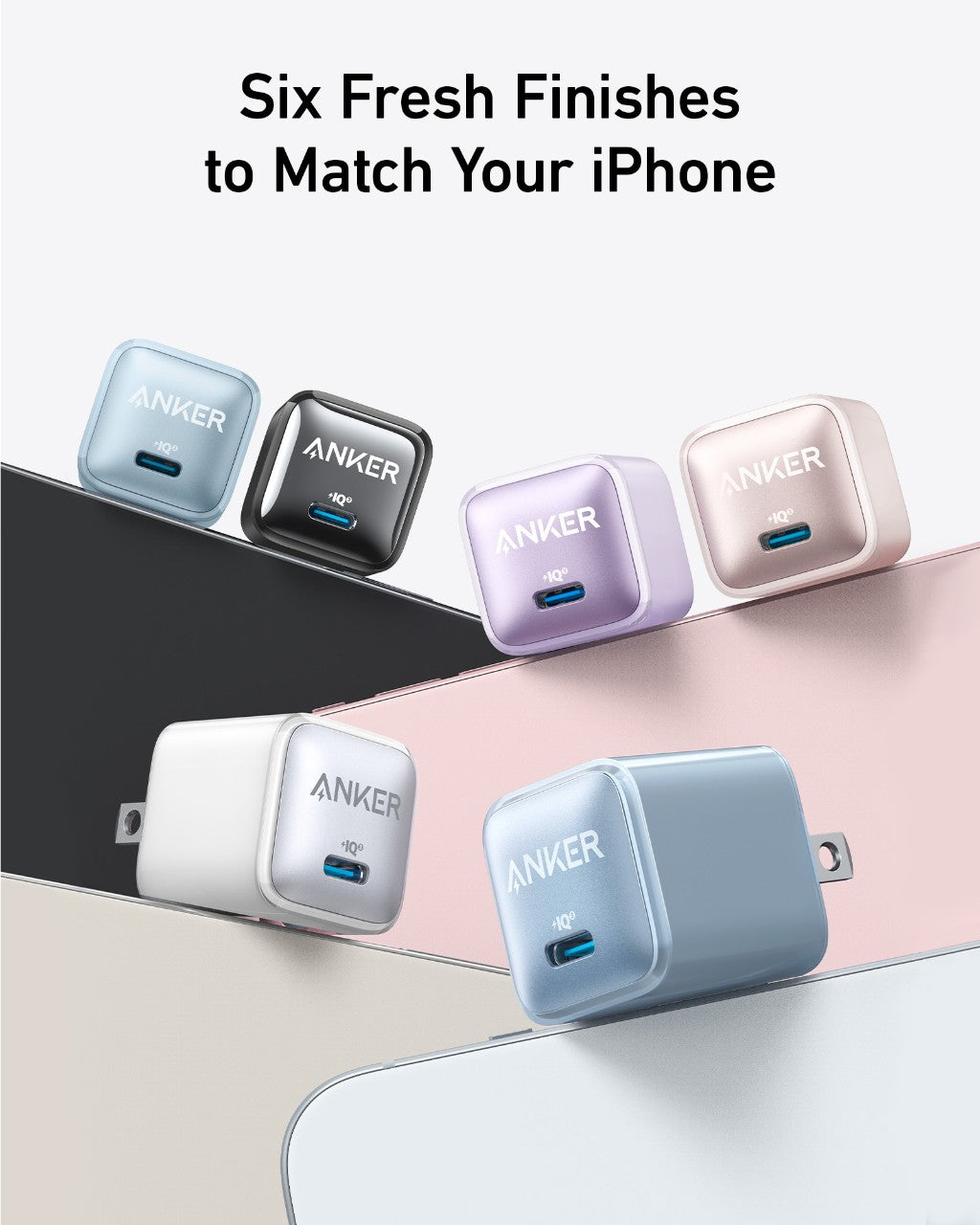 Six Anker Nano Charger (20W) devices by Anker are shown in blue, pink, purple, black, white, and green against matching backgrounds with “Six Fresh Finishes to Match Your iPhone” overhead. Get fast charging for your iPhone.
