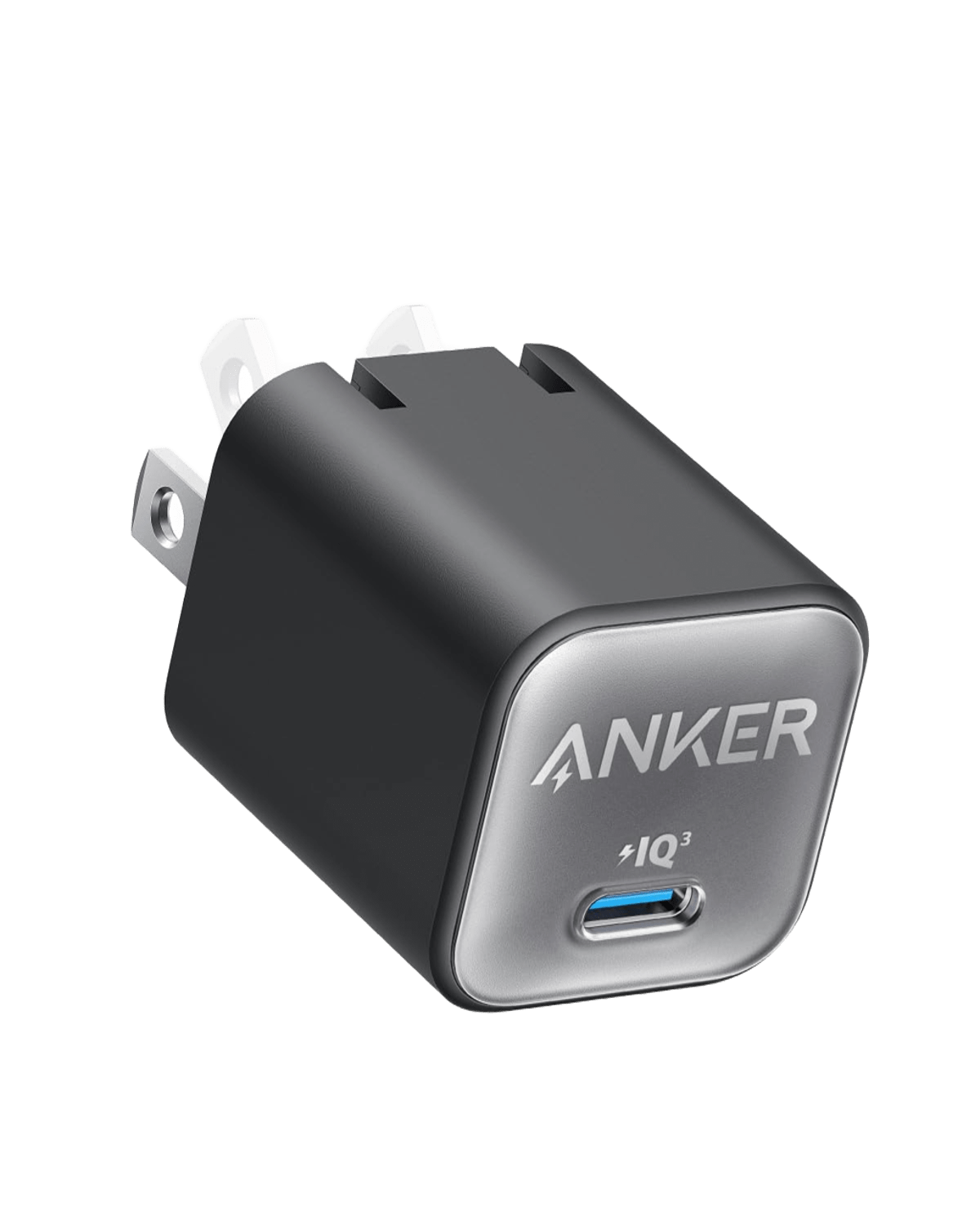 The Anker Nano Charger (30W) by Anker features a black and silver design, foldable plug, single USB-C port marked “ANKER” and “IQ³.” This compact GaN charger enables fast charging and is shown angled on a plain white background.