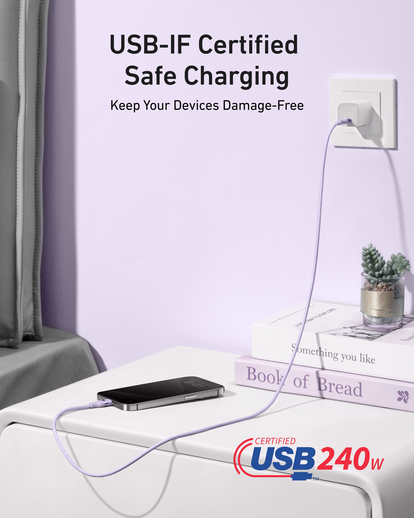 An Anker USB-C to USB-C Cable (240W, Upcycled-Braided) charges a smartphone on a white bedside table, plugged into a wall socket. Next to the phone is the Book of Bread. "USB-IF Certified Safe Charging" and the USB 240W logo are shown above.