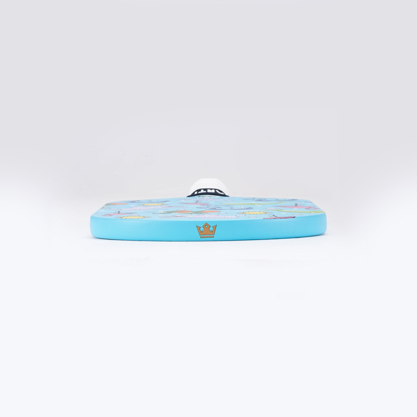 A blue kickboard featuring colorful cartoon sea creatures and a gold crown logo at the bottom, photographed on a white background—mirroring the vibrant design of the ARTI Carbon Fiber "FLORIDA" Paddle by ARTI.