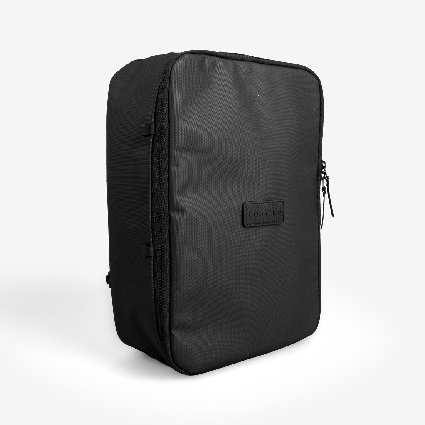 The FORWRD Court Caddy Shoe Cube is a sleek, rectangular black zippered bag with a matte finish and embossed logo patch, perfect for organizing essentials—use it as a stylish shoe cube or compact court caddy.