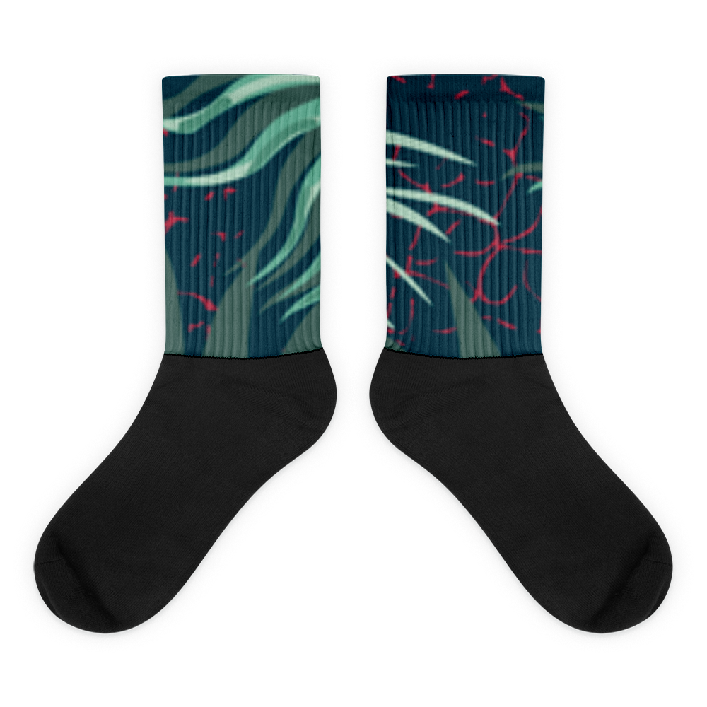 Crown Pickleball – Tropical Socks (Green): Crew-length, cushioned socks with solid black feet, ribbed uppers, and an abstract plant design in green and teal with bright red accents. Shown flat side by side, toes pointing down.