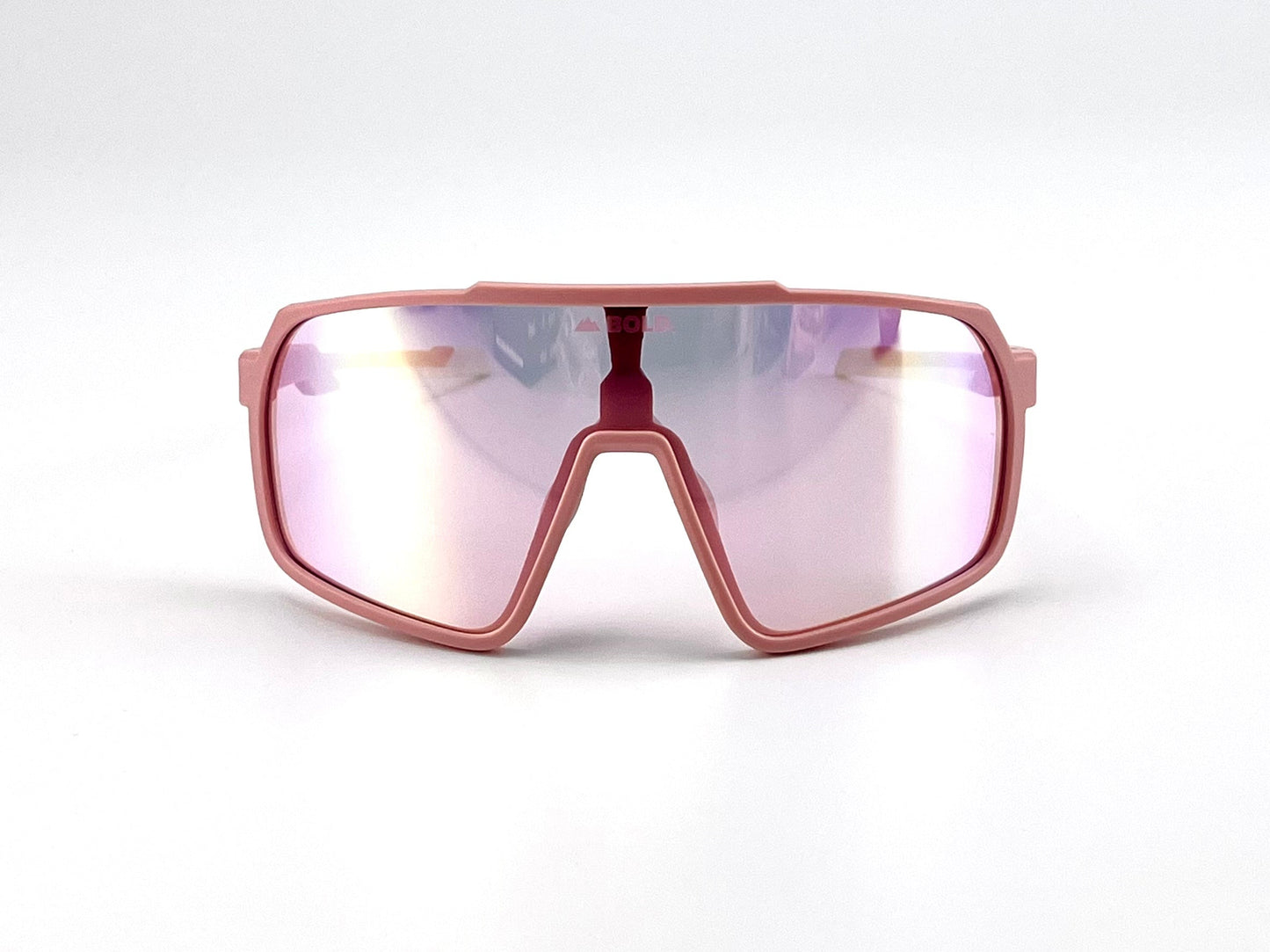 The BOLD Slayers Performance Sunglasses by boldouterwear feature an oversized, wraparound pink frame with mirrored iridescent lenses, showcased on a white background for a sporty, futuristic vibe.