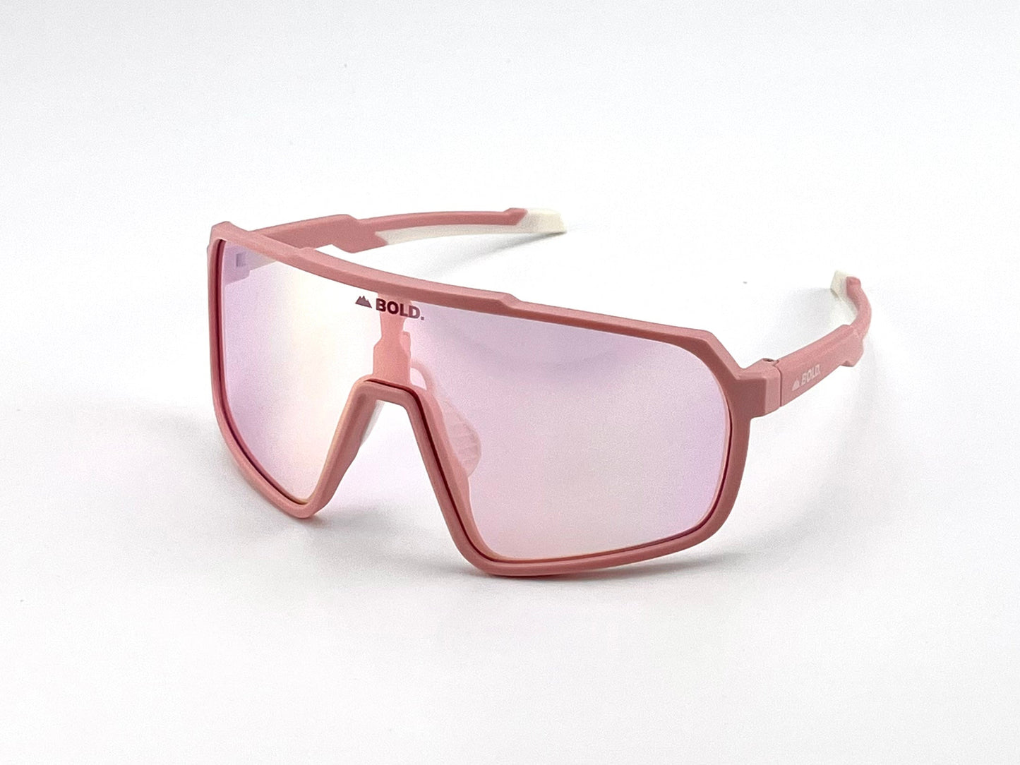 BOLD Slayers Performance Sunglasses by boldouterwear feature a pink oversized frame, mirrored pink-tinted shield lenses with "BOLD." in black on the upper left lens, and a comfy wraparound fit, shown against a plain white background.