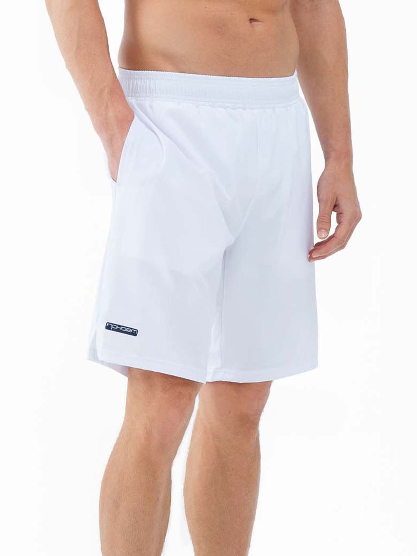 A man with a bare upper body wears inPhorm NYC's Classic Performance Men's Tennis Short in white, featuring an elastic waistband, built-in short liner, side pocket, and a small black-and-blue logo on the lower left.