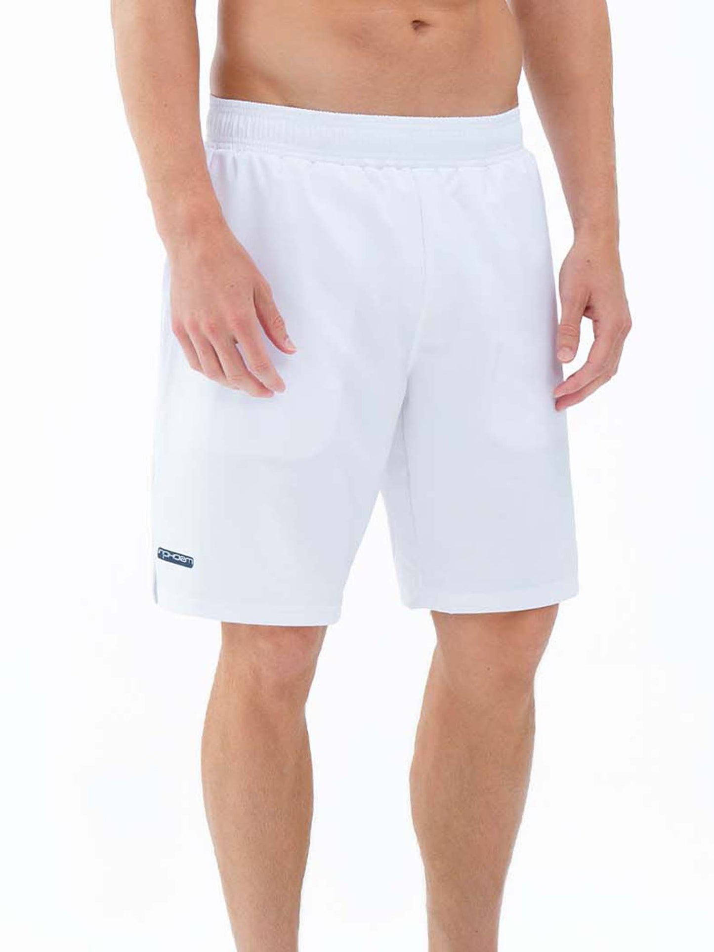 A shirtless person with a toned upper body (head not visible) stands against a plain white background wearing inPhorm NYC's Classic Performance Men's Tennis Short in white, featuring an elastic waistband, quick-dry fabric, built-in liner, and small dark logo.