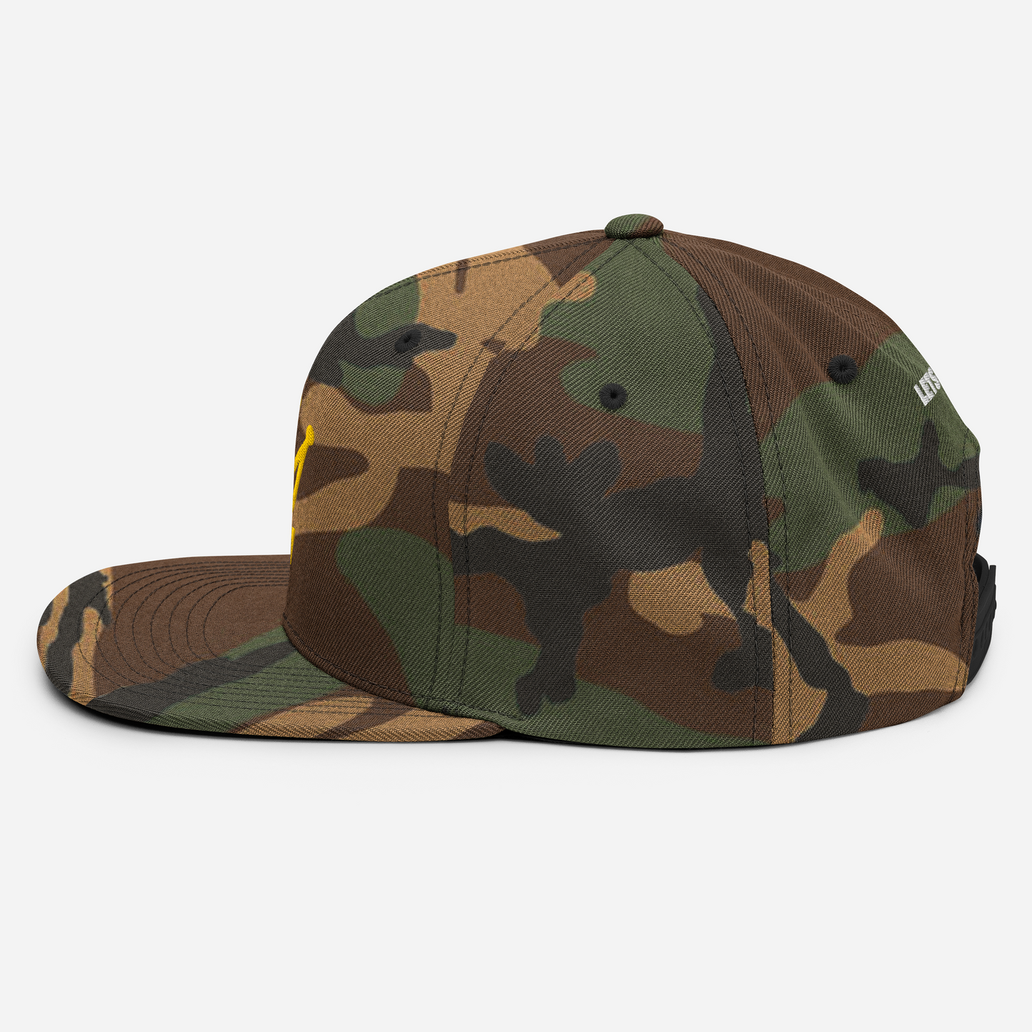 The CROWN PICKLEBALL - Corona Snap-back Hat (Camo) by Crown Pickleball features a flat brim, camo print in green, brown, and tan, yellow front embroidery, and small white side text. Shown from the side against a white background.