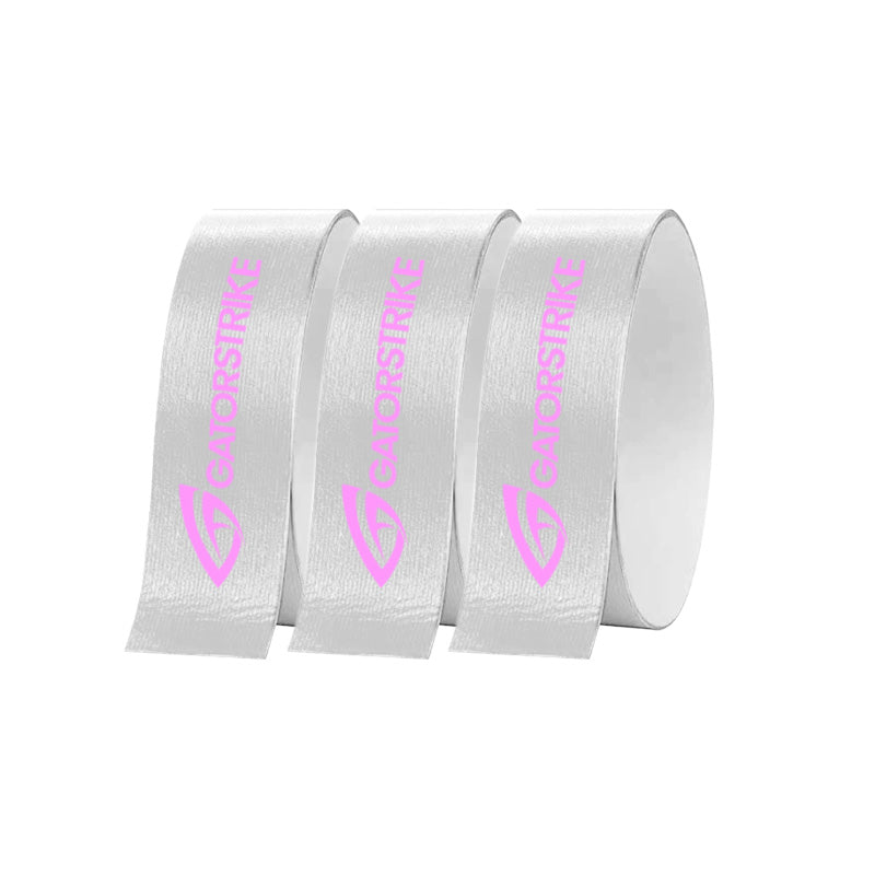 Three upright rolls of GATORSTRIKE™ Edge Guard Tape - 3 Pack feature pink GATORSTRIKE logos with a stylized gator head, designed for paddle edge protection. The background is plain white.