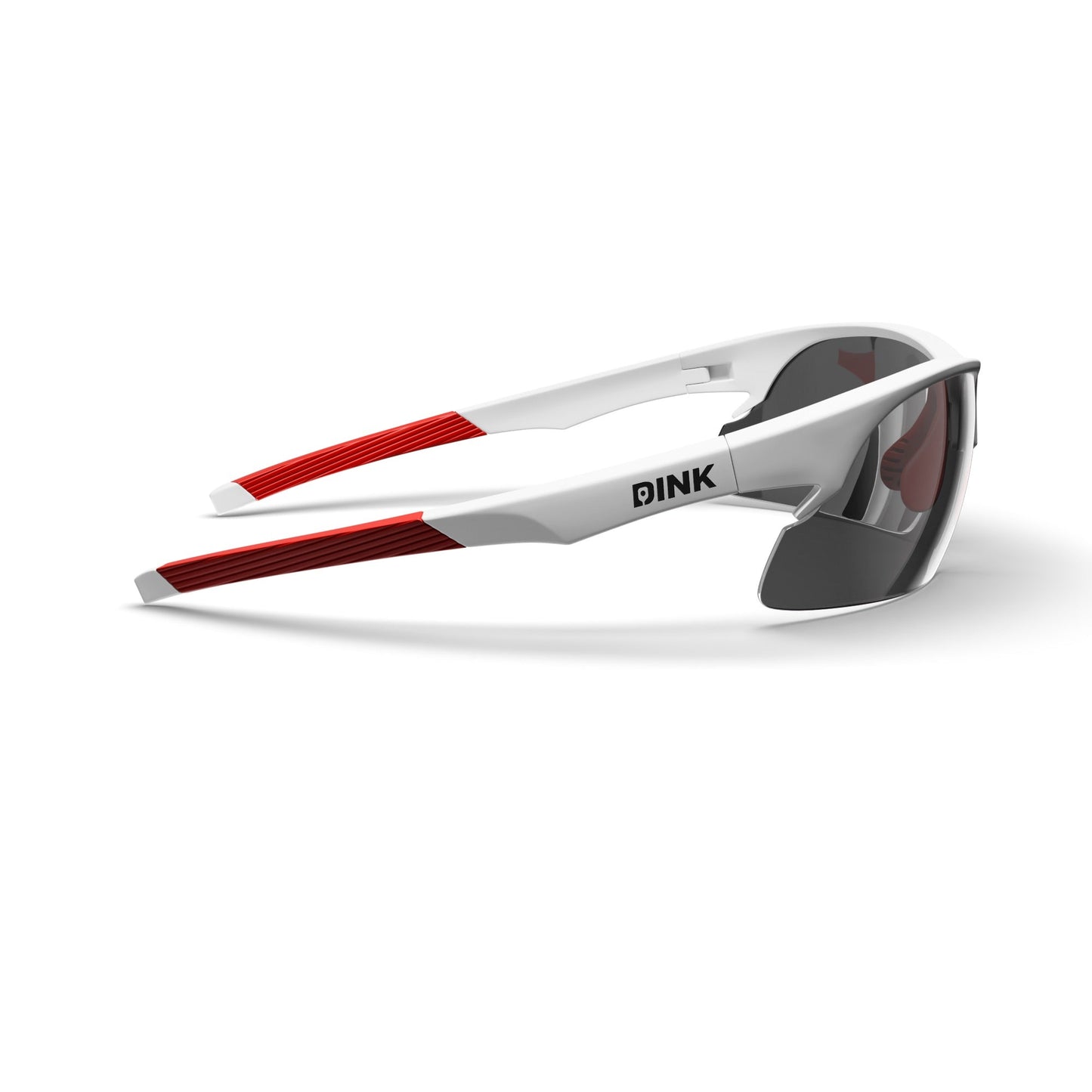 The Daytona Sunglasses - White/Red by Dink Eyewear feature a lightweight white frame with red arm accents, dark wraparound lenses with a rimless lower edge, and the Dink Eyewear brand printed in black on the side.