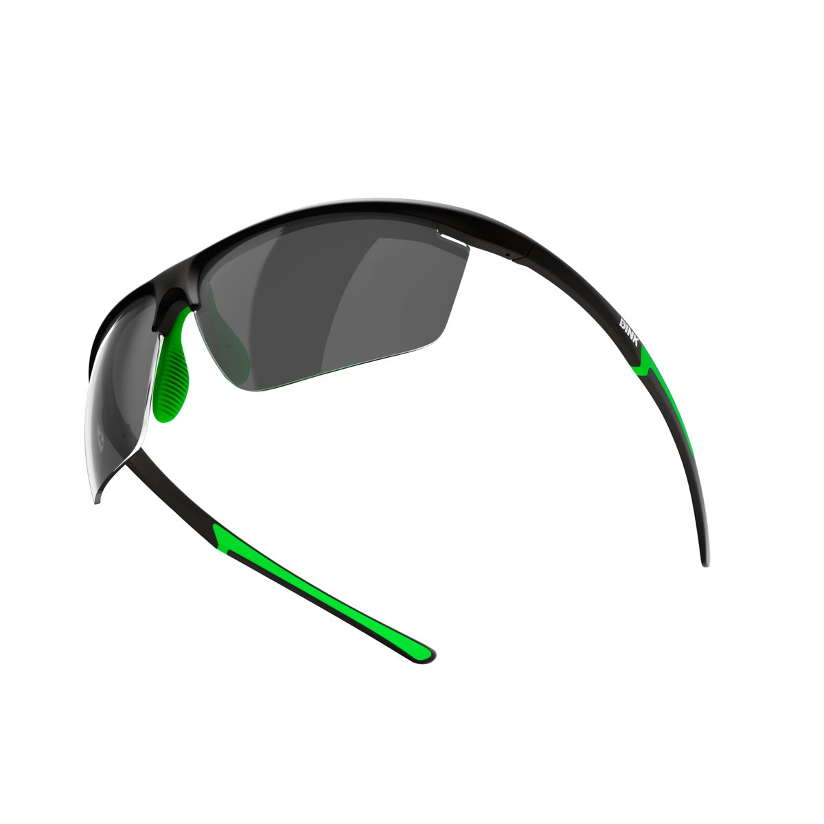 The Dink Eyewear Daytona Petite Pickleball Sunglasses feature a sporty wrap design, black frames, dark tinted lenses, and bold green accents at the arms and nose pads for a sleek, modern look.