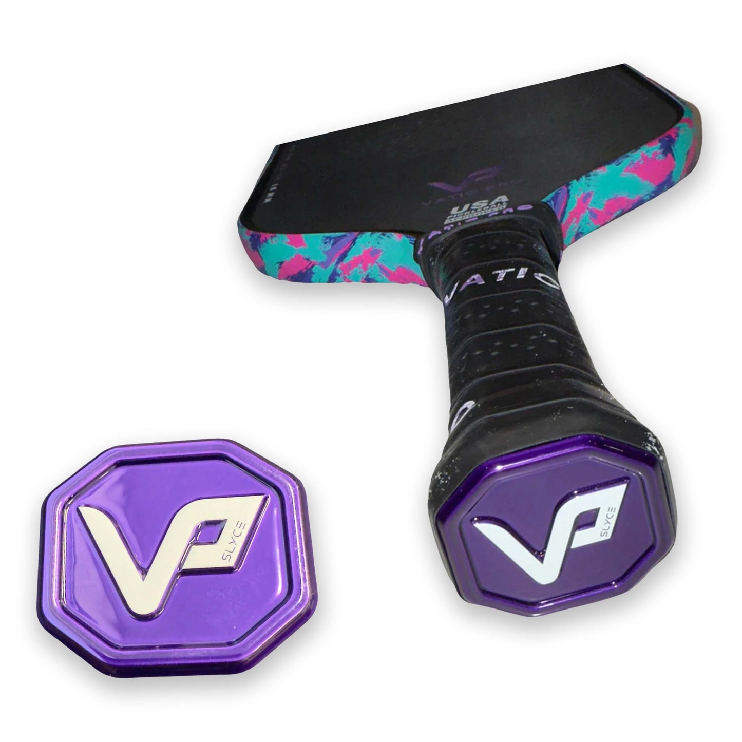 A Slyce Sport Special Edition Vatic Pro SpeedCap (28g, 1.0 oz.) Paddle Performance Enhancer and a matching purple grip cap with white VP logos are shown on a white background, featuring black grips and pink, teal, and purple swirl edges.